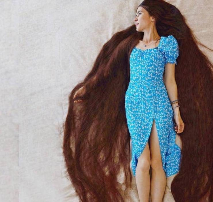 Українка потрапила до Книги рекордів Гіннеса – у неї найдовше волосся у світі