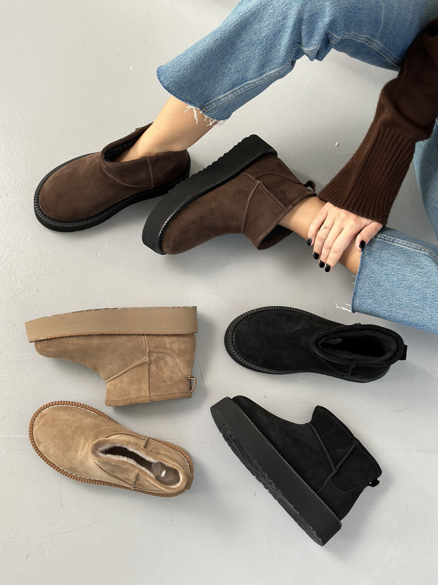 Від хутряних балеток до утеплених лоферів: головні тренди взуття холодного сезону