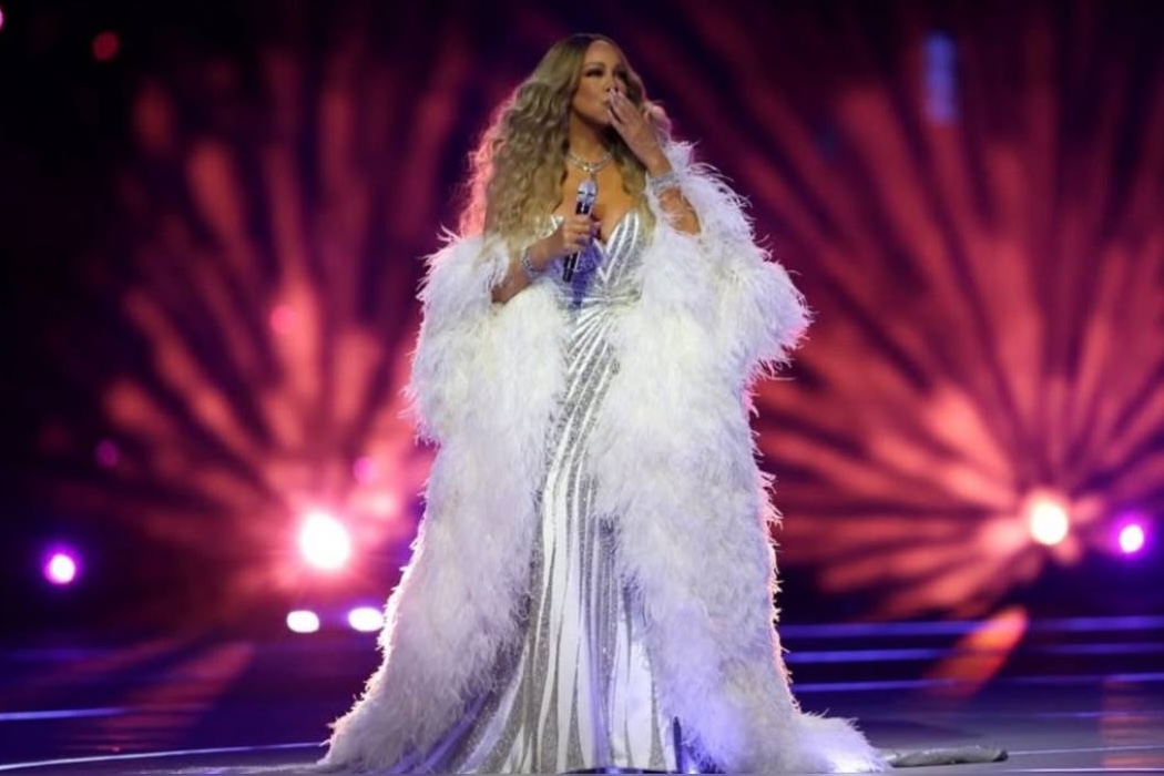 Мерая Керрі, Шарліз Терон та Вітторія Черетті на церемонії відкриття Олімпійських ігор